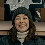 Profilfoto einer Frau mit Wintermütze.