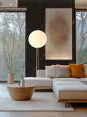 Wandpaneel in Marmoroptik, Black Marquina Gold, montiert über Sofa, Wohnzimmer